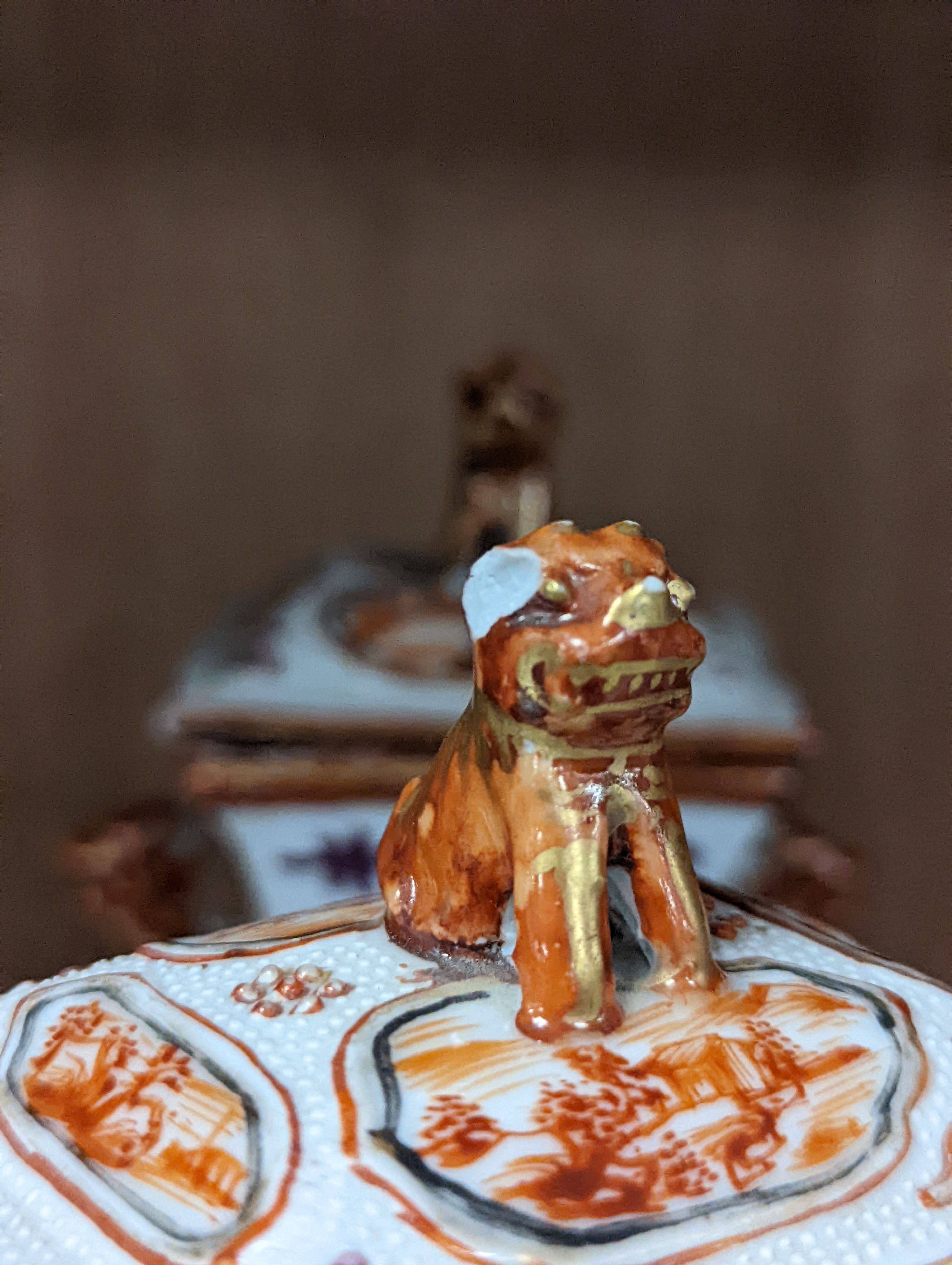 A pair of 18th century Chinese export square form famille rose vases and covers with phoenix handles - 24.5cm tall